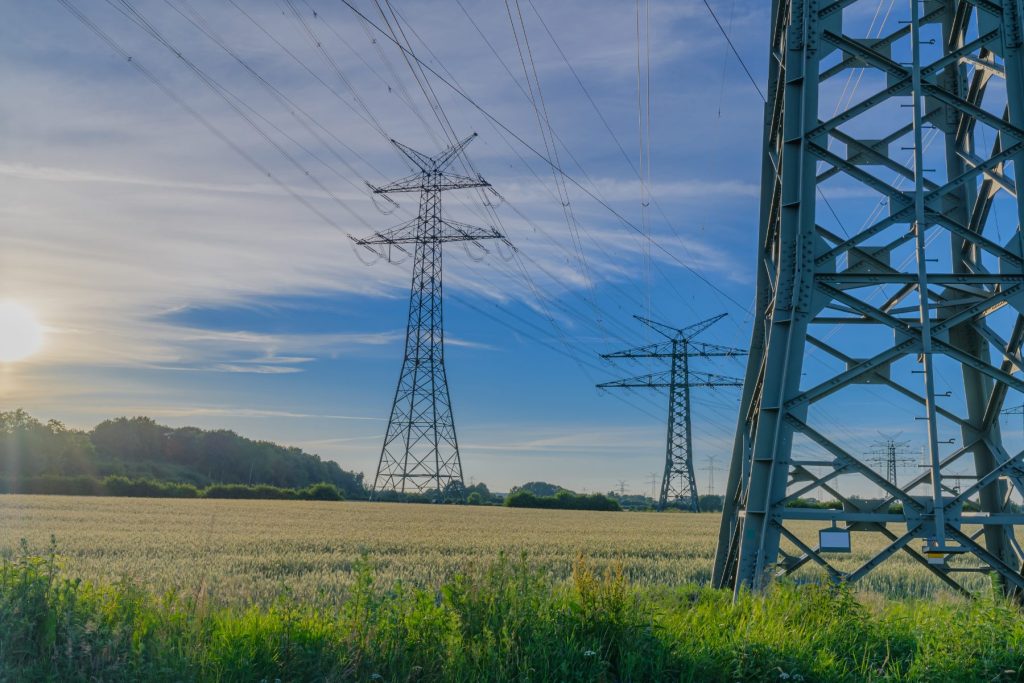 Power line with country side landscape.
